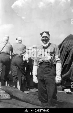 Royal Navy Chief Petty Officer dressed in Anti Flash rig in preparation of the British first H Bomb Test above Christmas Island, known as Operation Grapple, 15th May 1957. Stock Photo