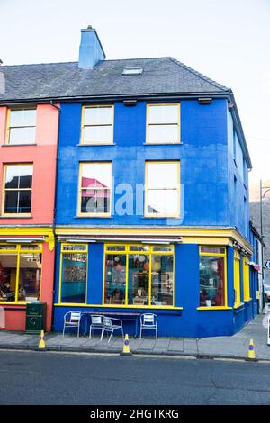 Colourful,building,housing,Pete's Eats,cafe,restaurant,meeting,place,popular,with,climbers,hikers,walkers,especially,their,all day breakfast,High Street,Llanberis,Llanberis village,is,a community and electoral ward in, Gwynedd, northwest Wales, on the southern bank of the lake Llyn Padarn and at the foot of Snowdon, the highest mountain in Wales.Rural,countryside,scenic,scenery,in,on,at,Snowdonia,Snowdonia National Park,Mid,North,West,Kingdom,North Wales,Wales,Welsh,GB,Great Britain,British,UK,United Stock Photo