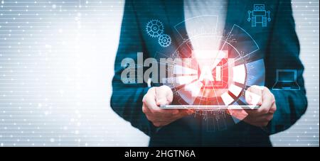 Businessman holding screen interface AI.line graph Screen Icon of a media screen on the black background, Technology Process System Business concept, Stock Photo