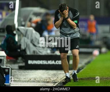 Aue, Germany. 22nd Jan, 2022. Soccer: 2nd Bundesliga, FC Erzgebirge Aue - FC Schalke 04, Matchday 20, Erzgebirgsstadion. Aue's team manager Marc Hensel reacts on the sidelines. Credit: Robert Michael/dpa-Zentralbild/dpa - IMPORTANT NOTE: In accordance with the requirements of the DFL Deutsche Fußball Liga and the DFB Deutscher Fußball-Bund, it is prohibited to use or have used photographs taken in the stadium and/or of the match in the form of sequence pictures and/or video-like photo series./dpa/Alamy Live News