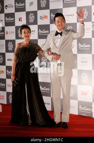 October 4, 2012 - Busan, South Korea : Actress Cho Min Soo and Actor lee Jung Jin pose for photo call during the 17th Busan International Film Festival Opening red carpet event at the Busan Cinema Center. Along with the now inevitable galaxy of stars promoting blockbusters from across Asia, this year's Busan International Film Festival will screen a North Korean film for the first time in almost a decade as well as six classic Afghan movies that were hidden in a wall to save them from the Taliban. Stock Photo