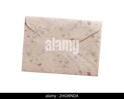 Handmade envelope. Kraft paper texture with subtle flower petals and fibers. Vintage style. Stock Photo