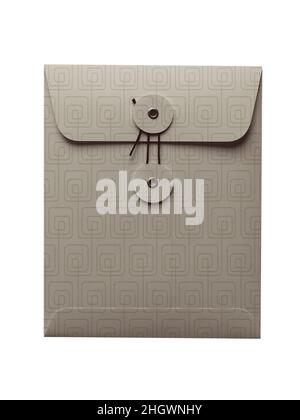 Elegant string envelope in beige shades isolated on white background. Kraft paper in a geometric pattern. Stock Photo