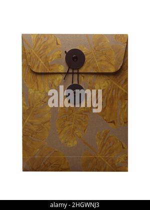 String envelope in vintage style isolated on white background. Golden leaves pattern. Kraft paper. Stock Photo