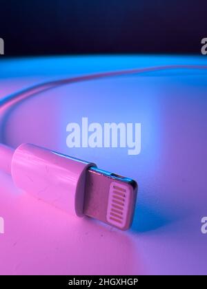 IPhone Charging and Data Cable - Lightning plug - FRANKFURT, GERMANY - JANUARY 22, 2022 Stock Photo