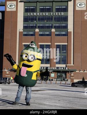 Green Bay, United States. 16th Jan, 2021. Green Bay Packers fan wearing a  Cheese Head cheers on his team as they defeat the Los Angeles Rams 32-18  during the Divisional Playoff at