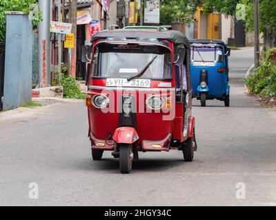 BTwo auto rickshaws, also called tuk-tuk, in Colombo, Sri Lanka