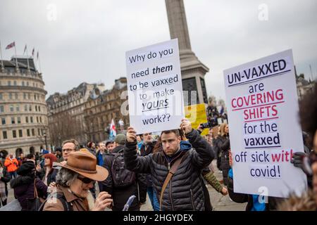 London, UK. 22nd Jan, 2022. A protester holds a placard in Trafalgar Square during the demonstration. Protesters marched through central London during a worldwide rally for freedom - protesting against government restrictions surrounding Covid 19 including mandatory vaccinations, particularly with NHS staff, who may face losing their job if they refuse to get vaccinated. Credit: SOPA Images Limited/Alamy Live News Stock Photo