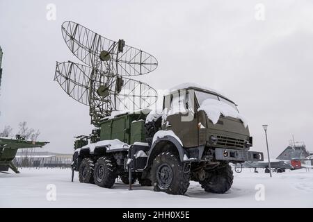 Satellite dishes or radio antennas sky. mobile air defense truck with radar antenna. Stock Photo
