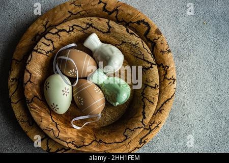 Easter dinner table settinf with colored eggs served on the table Stock Photo
