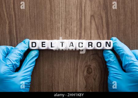 New covid-19 Deltacron variant strain symbol. Stock Photo