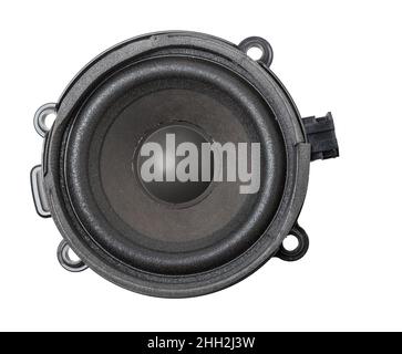Speaker of an acoustic system - an audio for playing music in a car interior on a white isolated background in a photo studio. Spare parts for auto re Stock Photo