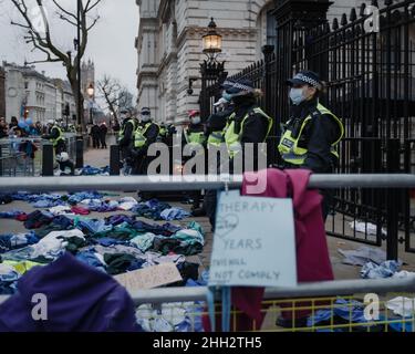 Nurses uniforms outside Downing Street in London following a protest by NHS staff and their supporters. Stock Photo