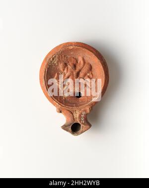 Terracotta oil lamp 1st century A.D. Roman. Terracotta oil lamp. Roman. 1st century A.D.. Terracotta. Early Imperial. Terracottas Stock Photo