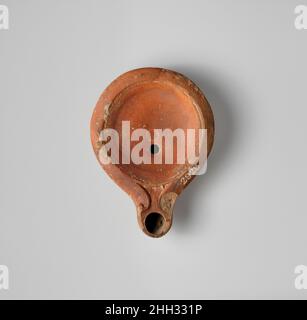 Terracotta oil lamp Roman, Cypriot. Terracotta oil lamp. Roman, Cypriot. Terracotta. Terracottas Stock Photo