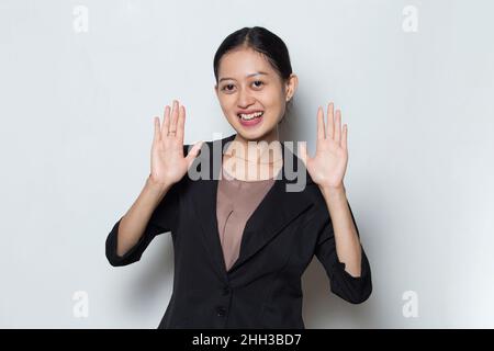 Asian business woman say hello isolated on white background Stock Photo