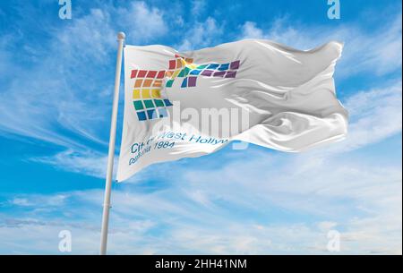 flag of West Hollywood, California at cloudy sky background on sunset, panoramic view. Patriotic concept about Boston and copy space for wide banner. Stock Photo