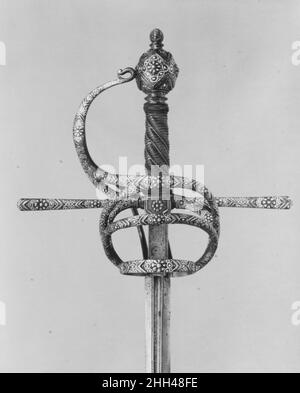 Rapier ca. 1620 Spanish The rapier was the principal civilian sidearm throughout the sixteenth and seventeenth centuries. Designed for cut-and-thrust fencing of progressively complex techniques, the rapier is characterized by a double-edged blade with an acute point and an elaborate guard for the hand. The guards, usually of iron or steel, were subject to a variety of embellishment. They were engraved, chiseled, gilded, damascened, and encrusted in gold and silver in keeping with fashionable styles. Unless otherwise noted, the materials, attributions, and dating given here refer to the hilts. Stock Photo