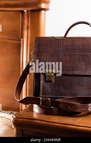 Brown leather briefcase with two locks. hotel room photo Stock Photo
