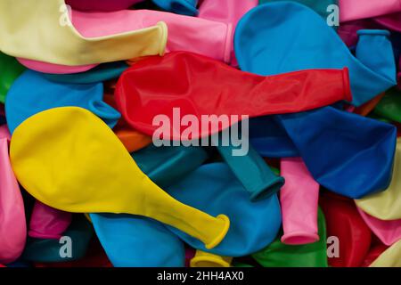 Colorful balloons and confetti .Festive or party background. Flat lay style. Copy space for text. Birthday greeting card.Selective focus.Summer holida Stock Photo