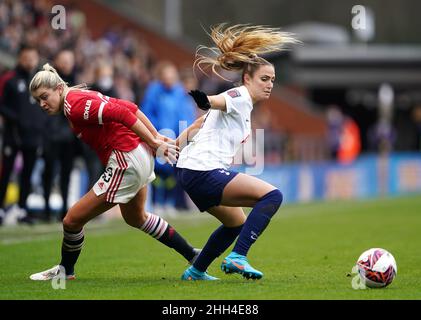 Manchester United's Alessia Russo (left) and Tottenham Hotspur's Shelina Zadorsky battle for the ball during the Barclays FA Women's Super League match at Leigh Sports Village, Greater Manchester. Picture date: Sunday January 23, 2022. Stock Photo