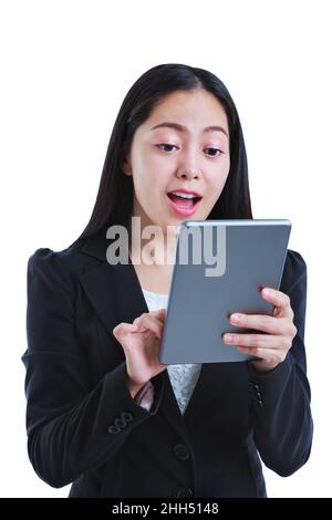 Beautiful asian female posing with expressive emotion, exited, shocked, surprised, isolated on white background. Successful businesswoman with suit lo Stock Photo