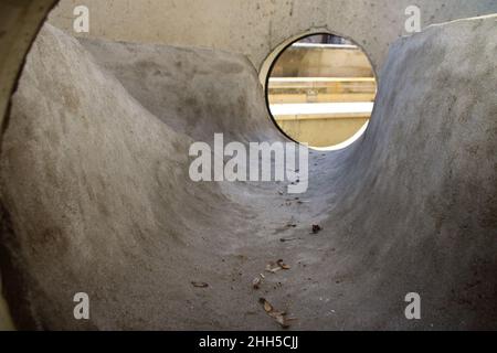 View into a sewage shaft from the perspective of the canal Stock Photo