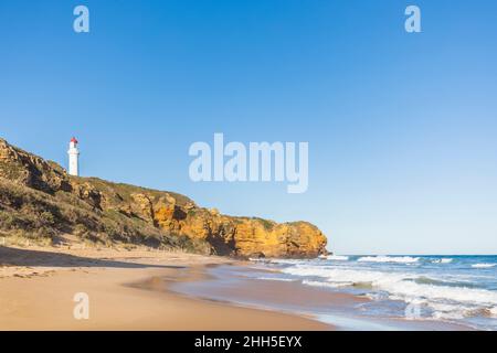 Clear sky over Fairhaven Beach with Split Point Lighthouse in background Stock Photo