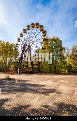Ukraine, Kyiv Oblast, Pripyat, Abandoned Ferris wheel in Pripyat Amusement Park Stock Photo