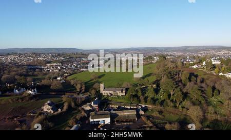 Wolborough Hill, Newton Abbot, Devon, England: Drone aerial view of the hill and the town of Newton Abbot - Dartmoor National Park in the distance Stock Photo
