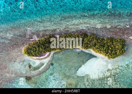 Desert island amidst sea in Lhaviyani Atoll, Maldives Stock Photo