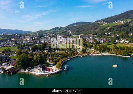 Austria, Upper Austria, Mondsee, Drone view of town on shore of Mondsee lake in summer Stock Photo