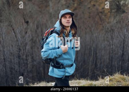 Contemplative hiker with backpack on vacation Stock Photo