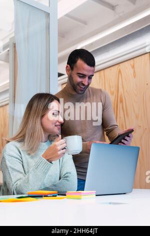 Business colleagues working over tablet PC in studio Stock Photo