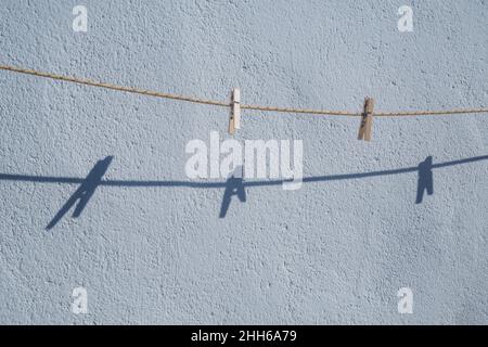 Clothespins on the rope Stock Photo