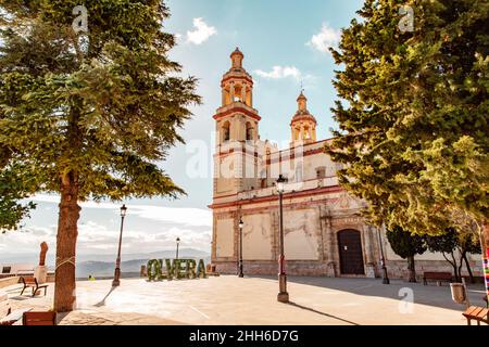 Church of Our Lady of the Incarnation he church square in Olvera. Andalusia Route of the White Towns Stock Photo