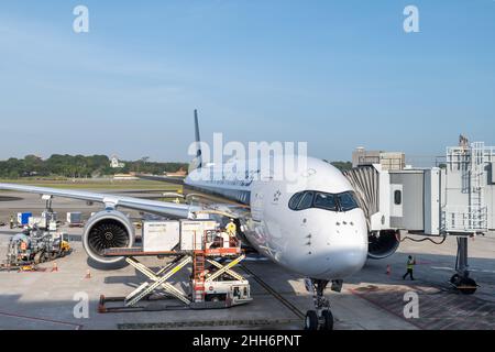 Singapore - January 2022: Singapore Airlines aircraft on the runway of Singapore Changi Airport. Singapore Airlines is the flag carrier of Singapore Stock Photo