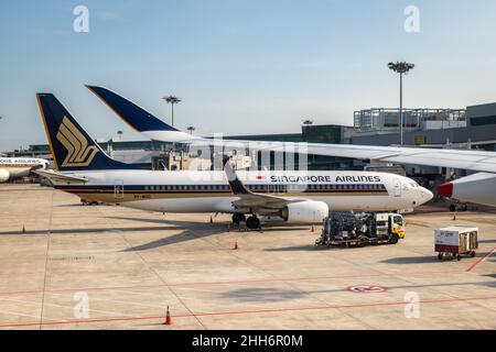 Singapore - January 2022: Singapore Airlines aircraft on the runway of Singapore Changi Airport. Singapore Airlines is the flag carrier of Singapore Stock Photo