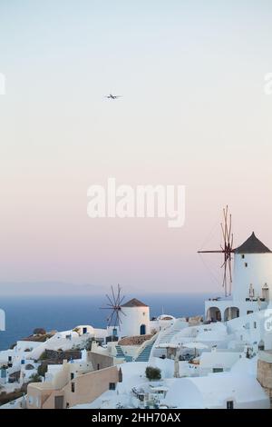 Oia town on Santorini island, Greece. Incredibly romantic sunrise on Santorini. Oia village in the morning light. Stock Photo