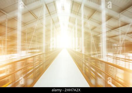 Exit light tunnel abstraction in metal constructions in motion Stock Photo