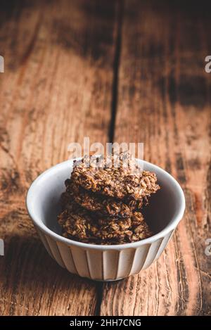 Banana oatmeal cookies with chocolate spread in bowl Stock Photo