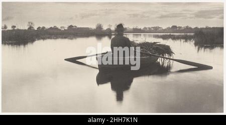 Rowing Home the Schoof-Stuff 1886 Peter Henry Emerson British, born Cuba Emerson immersed himself in the culture of East Anglia, featuring the marshy coastal region northeast of London in more than half a dozen photographically illustrated books during his ten-year photographic career. This print was included in his first publication, Life and Landscape on the Norfolk Broads, made with Goodall, a painter. Emerson and Goodall drew their subjects from an examination—at once personal and anthropological—of the environment and daily rituals of rural East Anglian life. In keeping with his interest Stock Photo