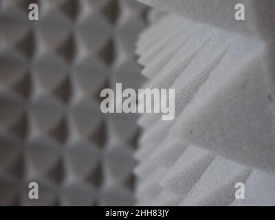 Pyramids of soundproof foam rubber, close-up. Sound-scattering material. Stock Photo