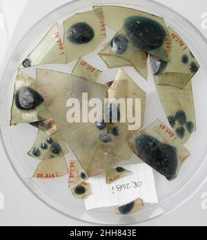 Glass Fragments from a Vessel 4th–early 5th century Coptic. Glass Fragments from a Vessel. Coptic. 4th–early 5th century. Glass. Made in Kharga Oasis, Byzantine Egypt. Glass-Vessels Stock Photo