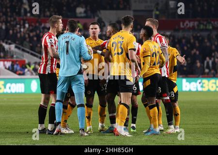 London, UK. 23rd Jan, 2022. Tempers get heated during the Premier League match between Brentford and Wolverhampton Wanderers at Brentford Community Stadium, London, England on 22 January 2022. Photo by Ken Sparks. Editorial use only, license required for commercial use. No use in betting, games or a single club/league/player publications. Credit: UK Sports Pics Ltd/Alamy Live News Stock Photo