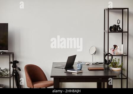Background image of minimal home workplace with loft design elements, copy space Stock Photo