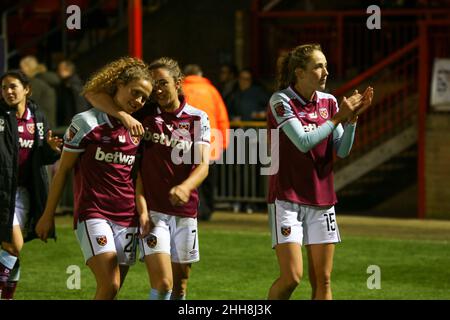 London, UK. 23rd Jan, 2022. London, England, 23rd November 2 Lucy Parker (15 West Ham) Lisa Evans (7 West Ham) and Lois Joel (20 West Ham) walking out of the picth after final whistle during the FA Womens Super League game between West Ham Utd and Everton at Chigwell Construction Stadium in London, England Credit: SPP Sport Press Photo. /Alamy Live News Stock Photo