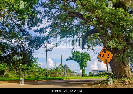 A height clearance sign is pictured on Shell Belt Road, July 1, 2021, in Bayou La Batre, Alabama. Stock Photo