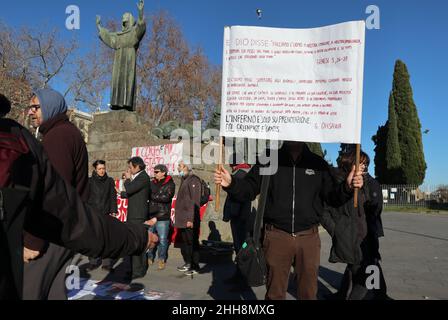 Activists protest against 'Green Pass' Covid 19 certificate in Rome, Italy, on January 22, 2022. According to the latest Italian Government's rules, to enter cafés, restaurants, metros, buses, trains, ferries, cinemas, theatres, museums, gyms, swimming pools, is mandatory the 'Super Green Pass' certificate, that can be obtained only with 2 or 3 Covid 19 vaccine doses or through the healing from the infection. On the other hand, to enter Universities, offices, banks, jails, and hairdressers and nail bars it's mandatory to show the 'Standard Green Pass' certificate, that can be obtained even w Stock Photo