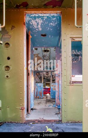Vandalised remains of old train carriage - part of the Trinity Loop, Newfoundland. DETAILS IN DESCRIPTION. Stock Photo